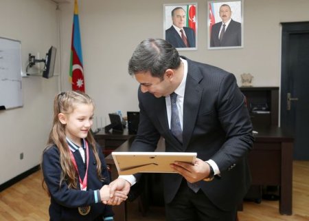 Elçin Kərimov Avropa çempionu olan şəhid övladı ilə görüşüb