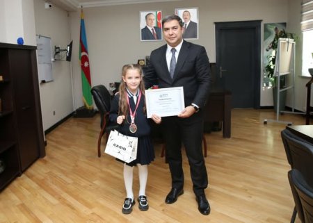 Elçin Kərimov Avropa çempionu olan şəhid övladı ilə görüşüb